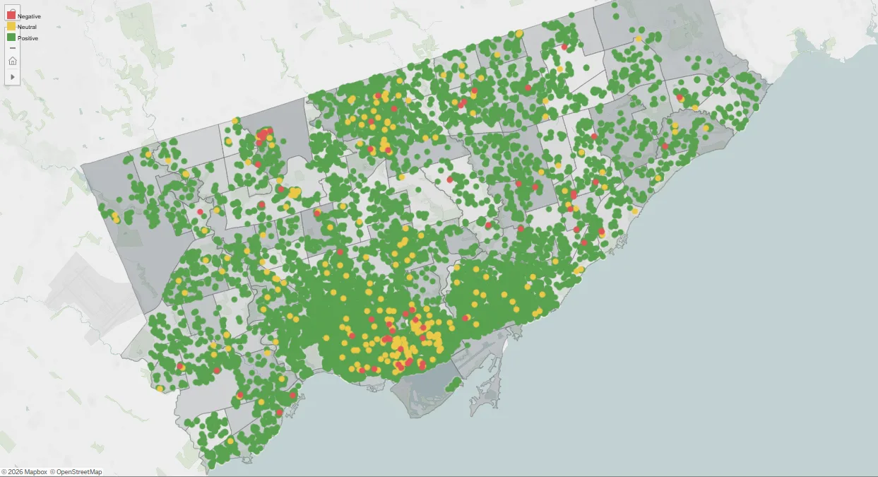 Map of Toronto with every reviewed Airbnb listing plotted as a dot coloured by review sentiment — overwhelmingly green, with yellow and red dots concentrated downtown